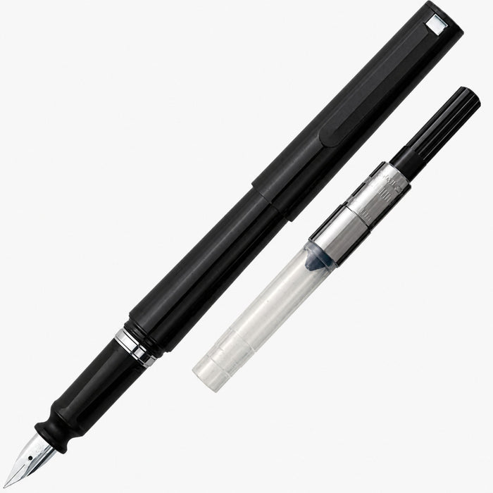 Sailor fountain pen shown with proprietary ink converter beside the pen body