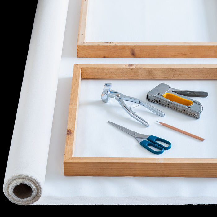 Canvas stretching tools including pliers, stapler, and stretcher bars