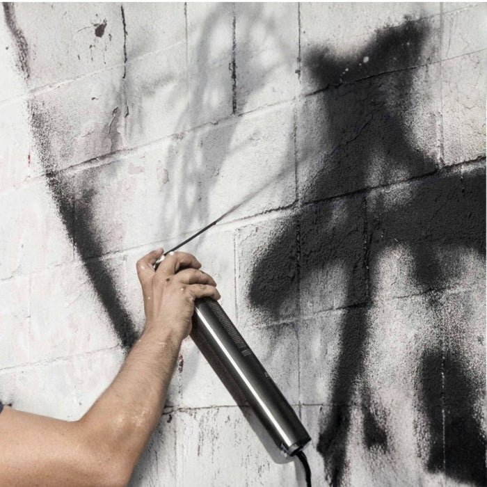 MTN Krink K-750 spray paint creating large-scale black markings on a wall with extended spray reach