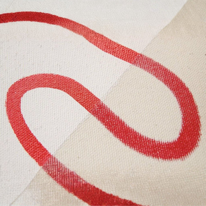 Close-up of spray gesso primer coverage and adhesion on artist canvas