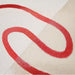 Close-up of spray gesso primer coverage and adhesion on artist canvas