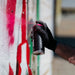 MTN Hardcore spray paint in use creating vibrant graffiti artwork on a wall