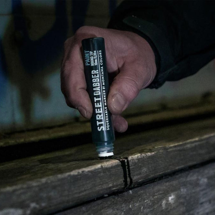 Montana Colors Street Dabber marker creating paint marks on wood surface