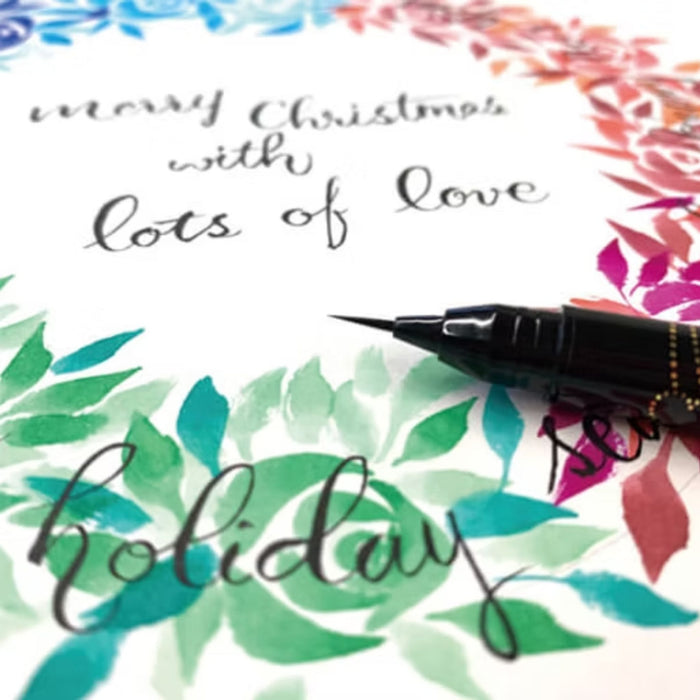 ZIG Ai Liner ultra-fine brush pen used for lettering 
