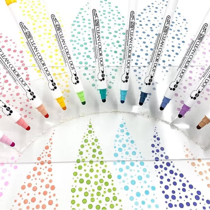 Assorted Kuretake ZIG Clean Colour Dot markers arranged with sample dot patterns