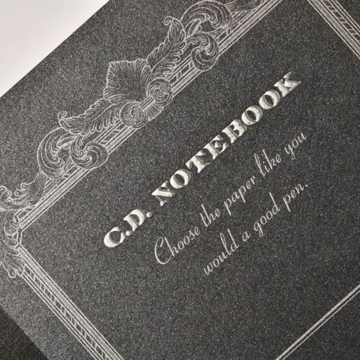 Detailed view of Apica Premium C.D. Notebook embossed cover and decorative frame