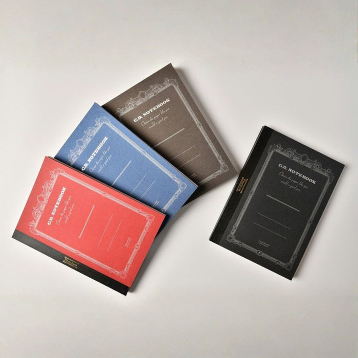 Apica Premium C.D. Notebook collection featuring red, blue, and plain paper editions