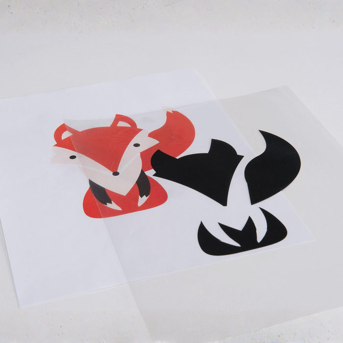 Inkjet transparency film layered over printed fox design for screen printing stencil preparation